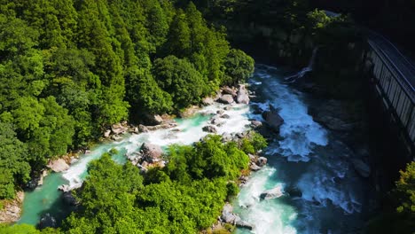 4k-Aerial-Tilt-Reveal-of-Shimanto-River-in-Kochi-Prefecture,-Shikoku-Japan