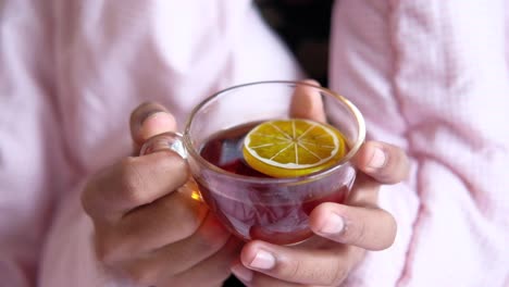 warm tea in a pink robe