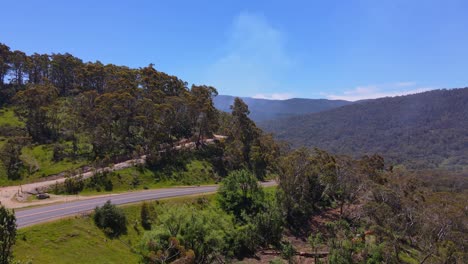 Aerial-tilt-up-shot-of-Crackenback-hills-during-daytime-in-New-South-Wales,-Australia