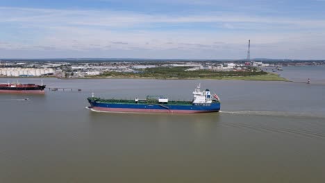 Industrial-Ship-Maritime-Nautical-Vessel-on-River-in-United-Kingdom,-Aerial