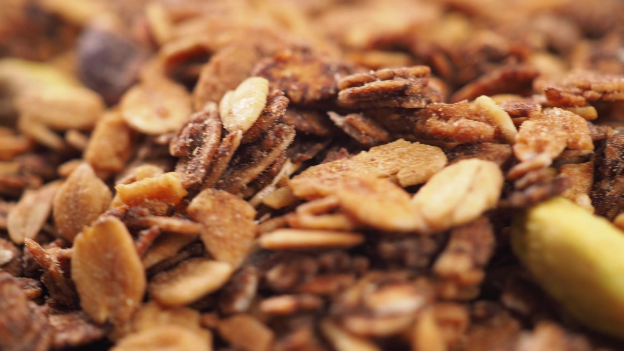 Close-up Macro Shot of Granola with Oats, Pistachios, and Dried Fruit