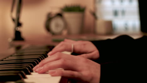 side view of woman playing keyboard