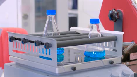 orbital shaker for mixing, shaking, blending biological samples in plastic vials