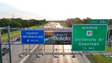 north dakota welcome sign above interstate highway