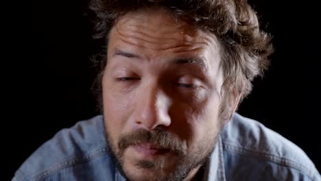 middle aged caucasian male looking at mirror and fixing hair, smiling and blinking, head portrait, close up