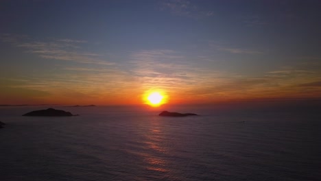 Very-beautiful-sunrise-aerial-flying-over-wild-ocean-in-summer-morning-in-Sydney-nature-from-the-peak-of-the-mountain