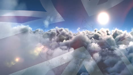 animation of flag of united kingdom over clouds