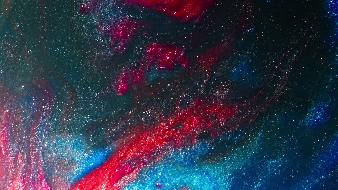 Vibrant colors swirling and blending in a mesmerizing macro shot of abstract fluid art