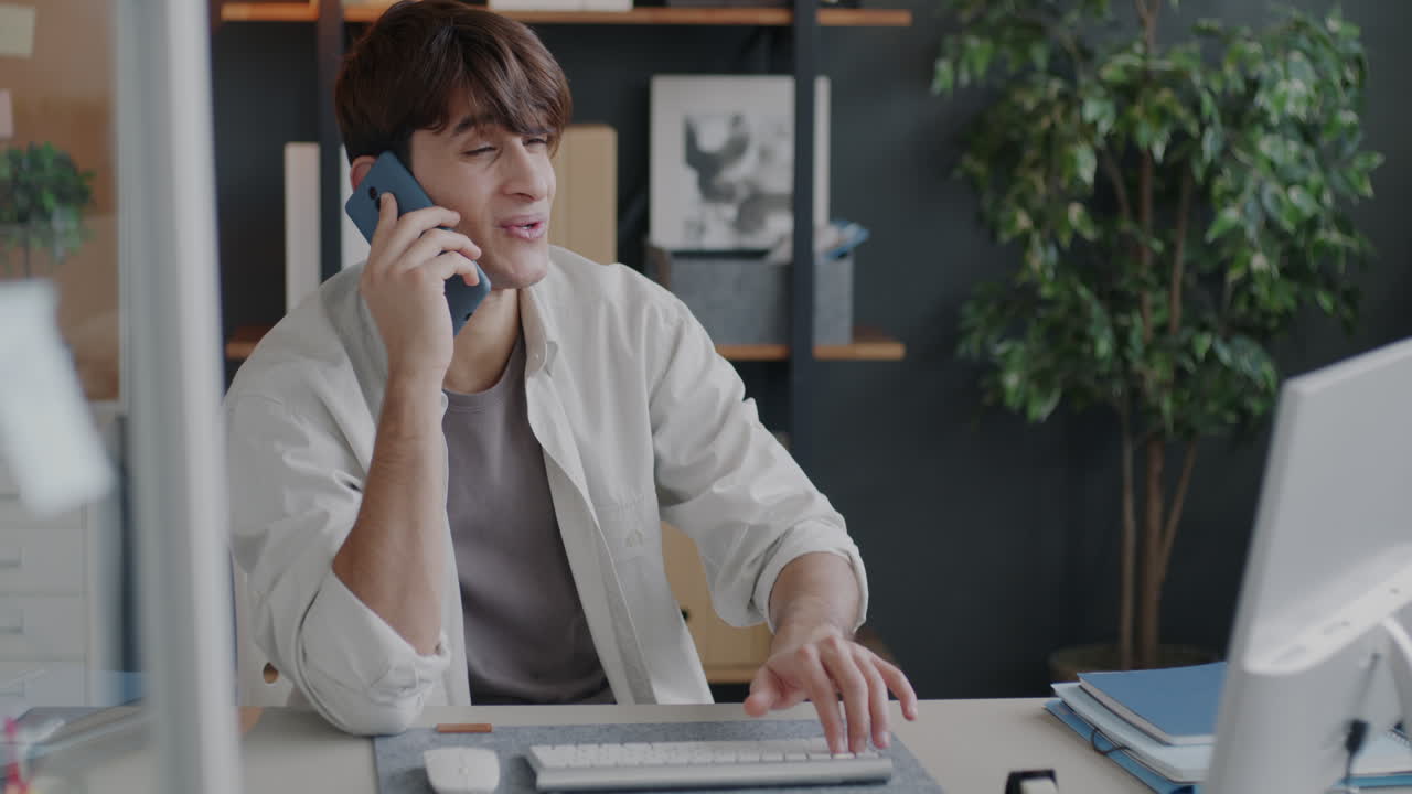 Man having a phone call in the office