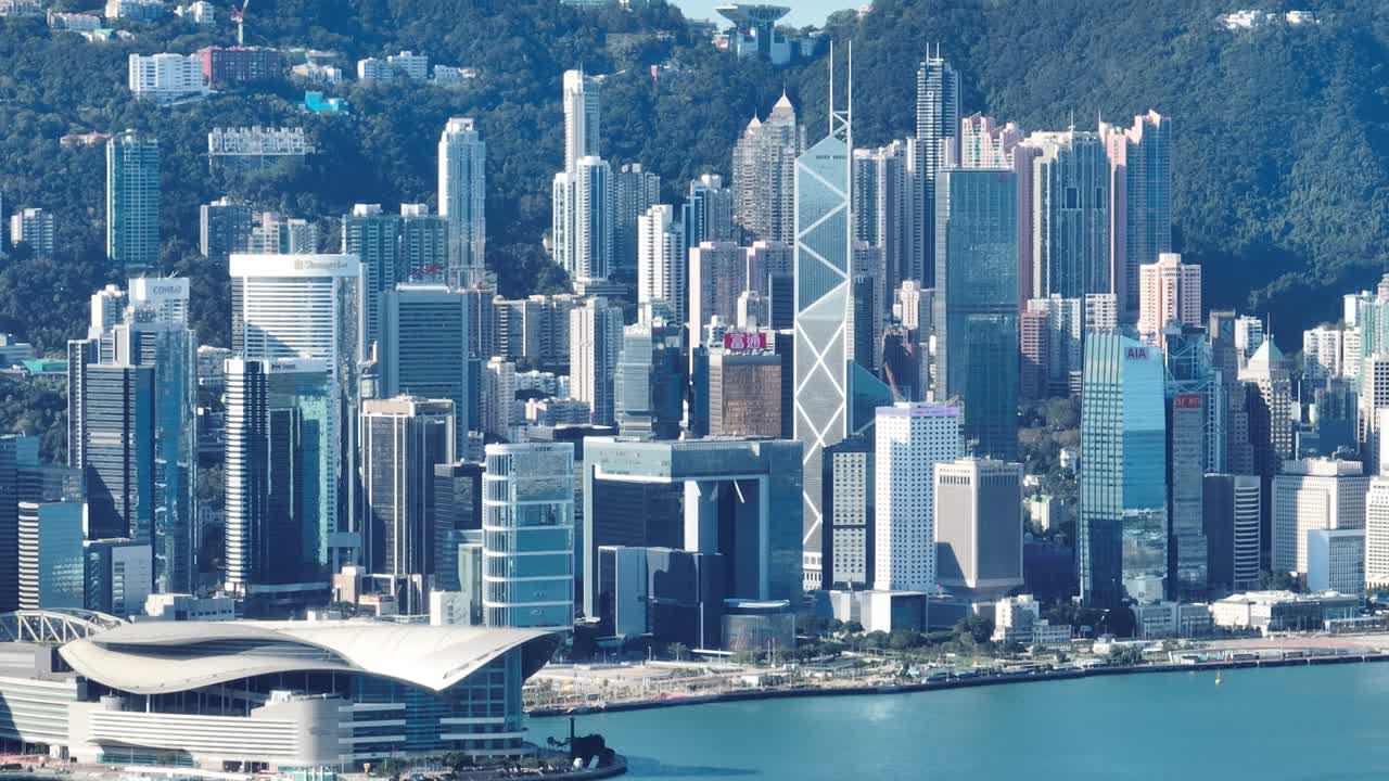 홍콩 센트럴 디스트릭트의 4k 텔레  뷰 - 하늘에서 느린 팬 항공 뷰 글.