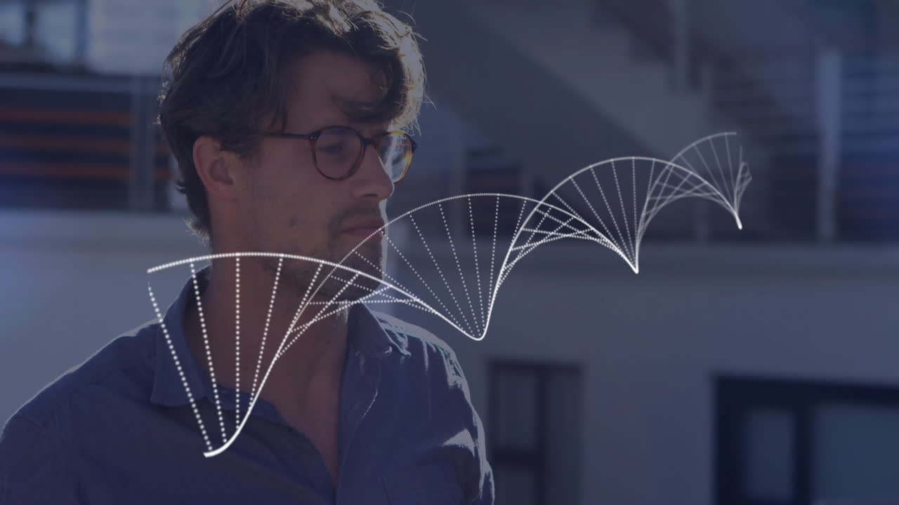 Mid-adult man standing in outdoor courtyard, showing digital wave arcs overlay for tech design