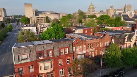 urban low income housing area with downtown in background