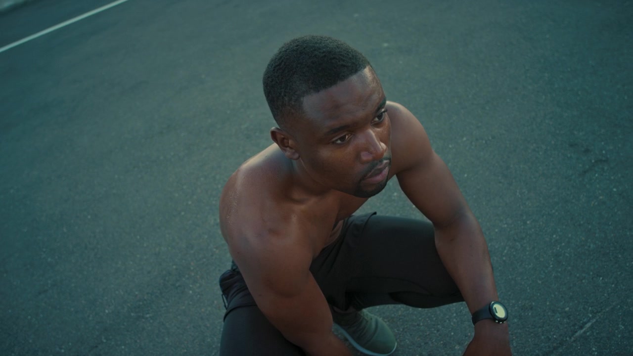 Shirtless Athletic Man Resting After Workout Outdoors