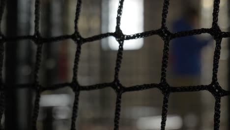 Indoor-Playground.-Black-Net-Closeup.-Slow-Motion-Footage