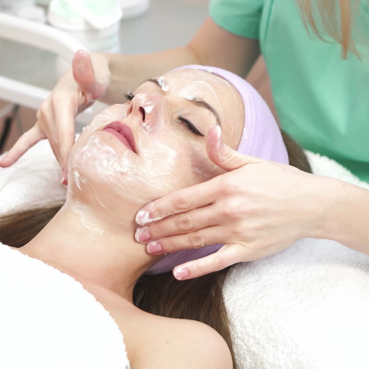 Woman during facial massage