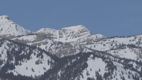 pan up mountain ridges to summits in far western wyoming