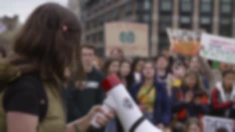 protester shouting through megaphone