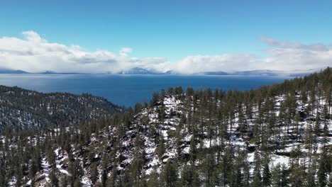 Aerial-view-of-Lake-Tahoe-amongs-winter-forest