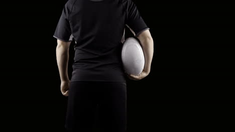 Serious-rugby-player-with-ball