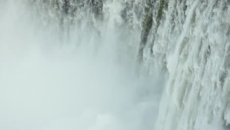 close up of niagara falls waterfall spray. canada. static, high angle