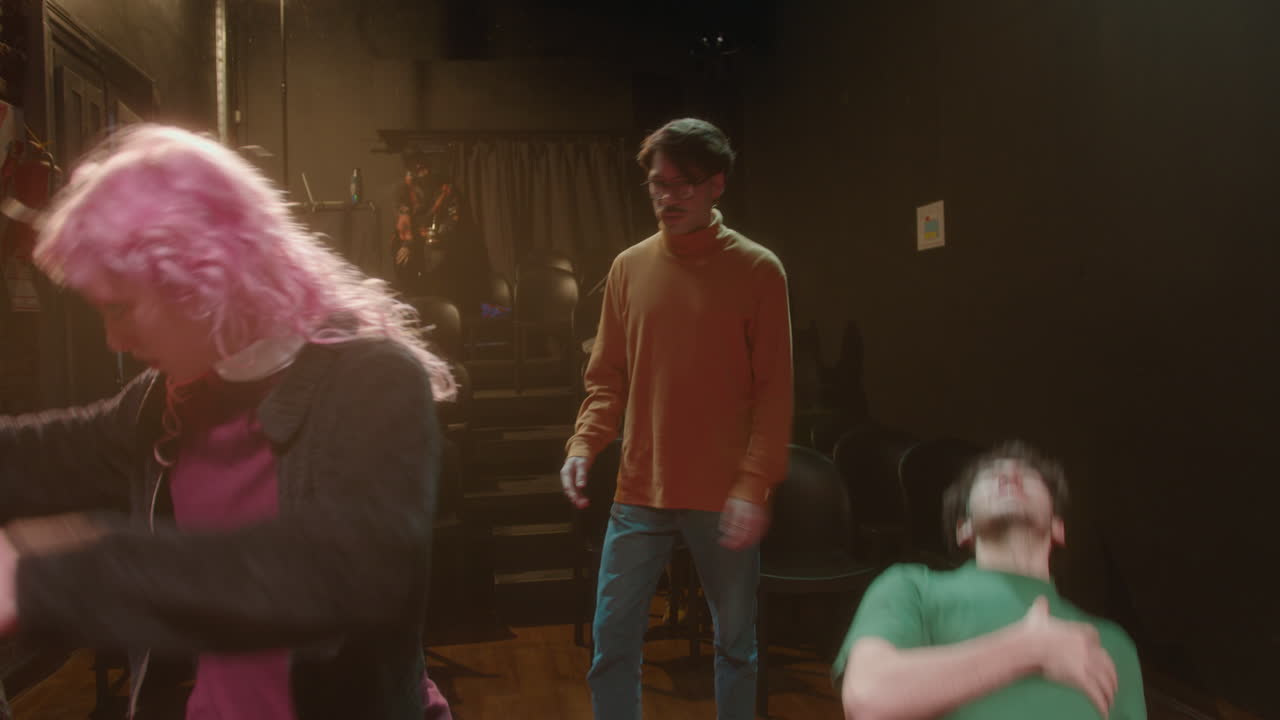 Young Actress Performing Pose on Theater Stage during Acting Class