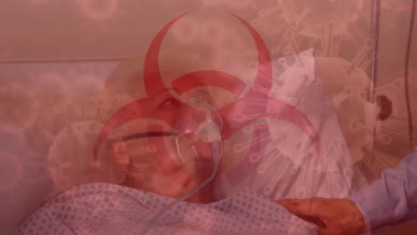 위험 신호와 코로나19가 백그라운드에서 산소 마스크를 착용한 노인 환자에게 퍼지고 있습니다.