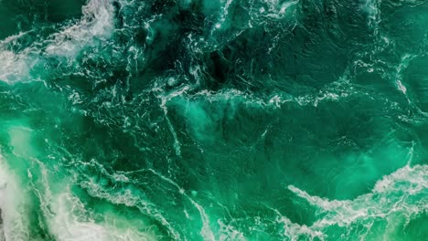 waves of water of the river and the sea meet each other during high tide and low tide.