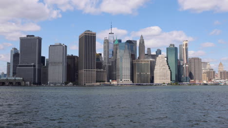 scenic view of downtown new york city as seen from brooklyn, capturing the iconic skyline and waterfront beauty across the east river