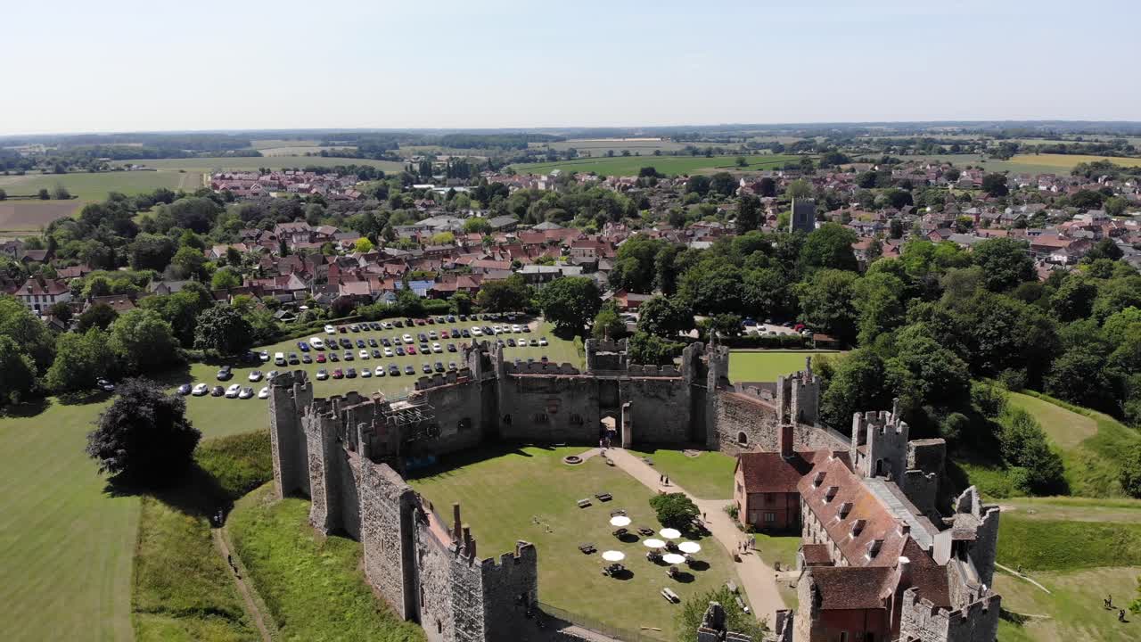 Reveal drone shot showing Framingham Castle in Suffolk, UK. 21.06.25