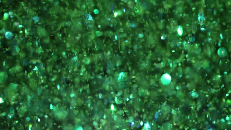 Green Glittering Bokeh Abstract Background