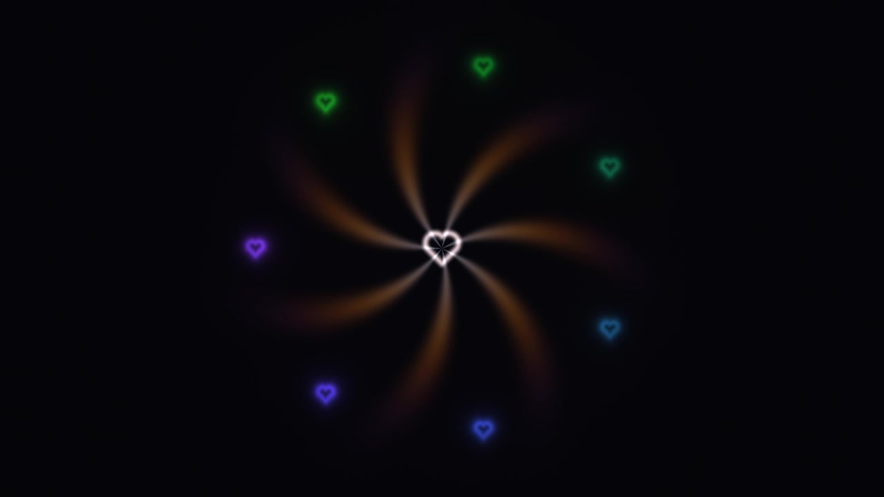 A series of colorful hearts swirl around a central heart, creating a lively pattern. The dark background highlights the vibrant colors. This motion can be great for festive events
