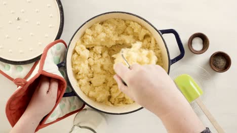 preparing classic mashed potatoes for thanksgiving dinner.