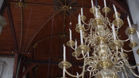 chandelier inside laurenskerk, rotterdam, the netherlands, detailed wooden ceiling