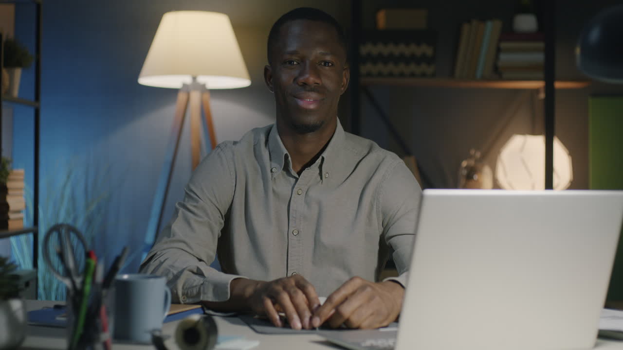Man Working Late at Night on Laptop