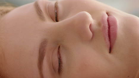 close up portrait beautiful woman lying on grass in peaceful countryside enjoying summer vacation relaxing in nature