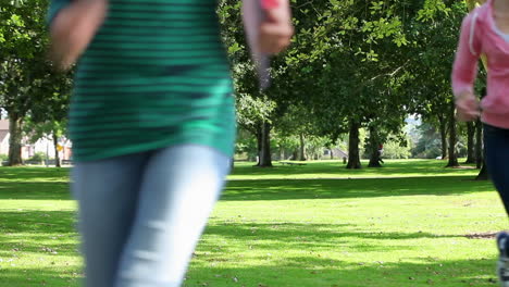 students running towards camera together