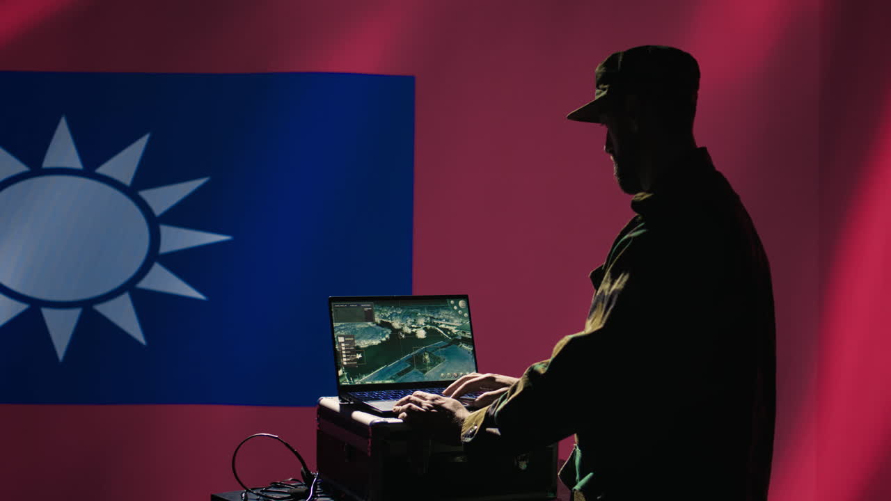 대만군 병사가 군사 침공 중에 레이더로 로켓을 스캔하고 있다.