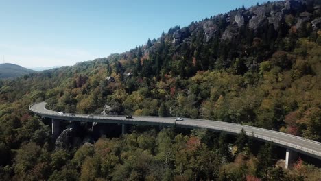 Aerial-Pullout-in-Fall,-Linn-Cove-Viaduct-in-4k-on-Grandfather-Mountain