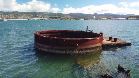 Static-close-up-shot-of-the-decaying-smoke-stack-of-the-sunken-World-War-II-battleship-USS-Arizona-at-Pearl-Harbor,-Hawaii