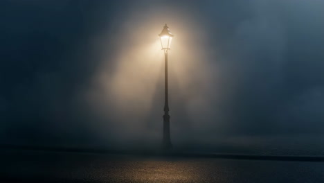 solitary lamp post in dense fog at night