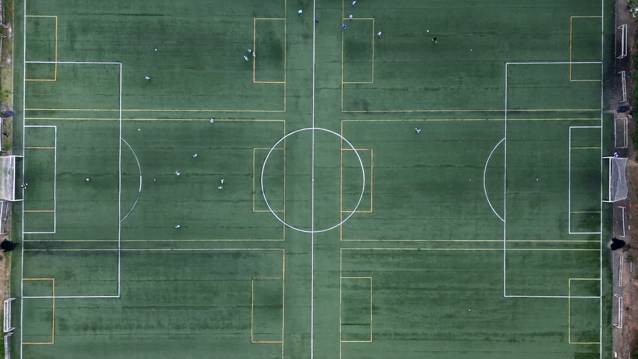 Aerial Top Down View Of Soccer Field With Players Playing Match, Sport Practice