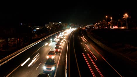 Hermoso-Lapso-De-Tiempo-De-La-Autopista-Tf-1-En-Las-Américas-Por-La-Noche,-Atasco-De-Tráfico-En-Hora-Pico,-Rayas-De-Luz,-Plano-General