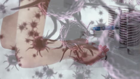 animación de células de macro coronavirus covid-19 que se propagan sobre una mujer lavándose las manos