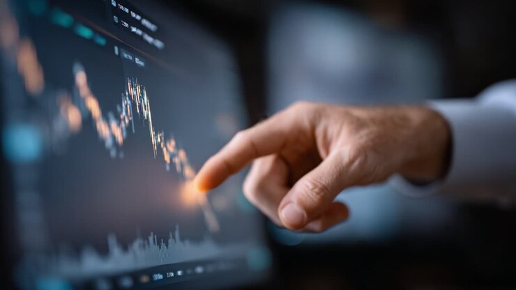 A Detailed Analysis of Market Trends: A Close-Up View of Hand Interacting with Stock Data on a Digital Screen Highlighting Price Movements and Financial Insights