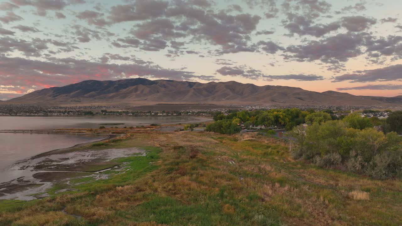 Clouds Fill The Sky At Sunrise Over Flat Top Mountain And Utah Lake In Saratoga Springs, United States Of America