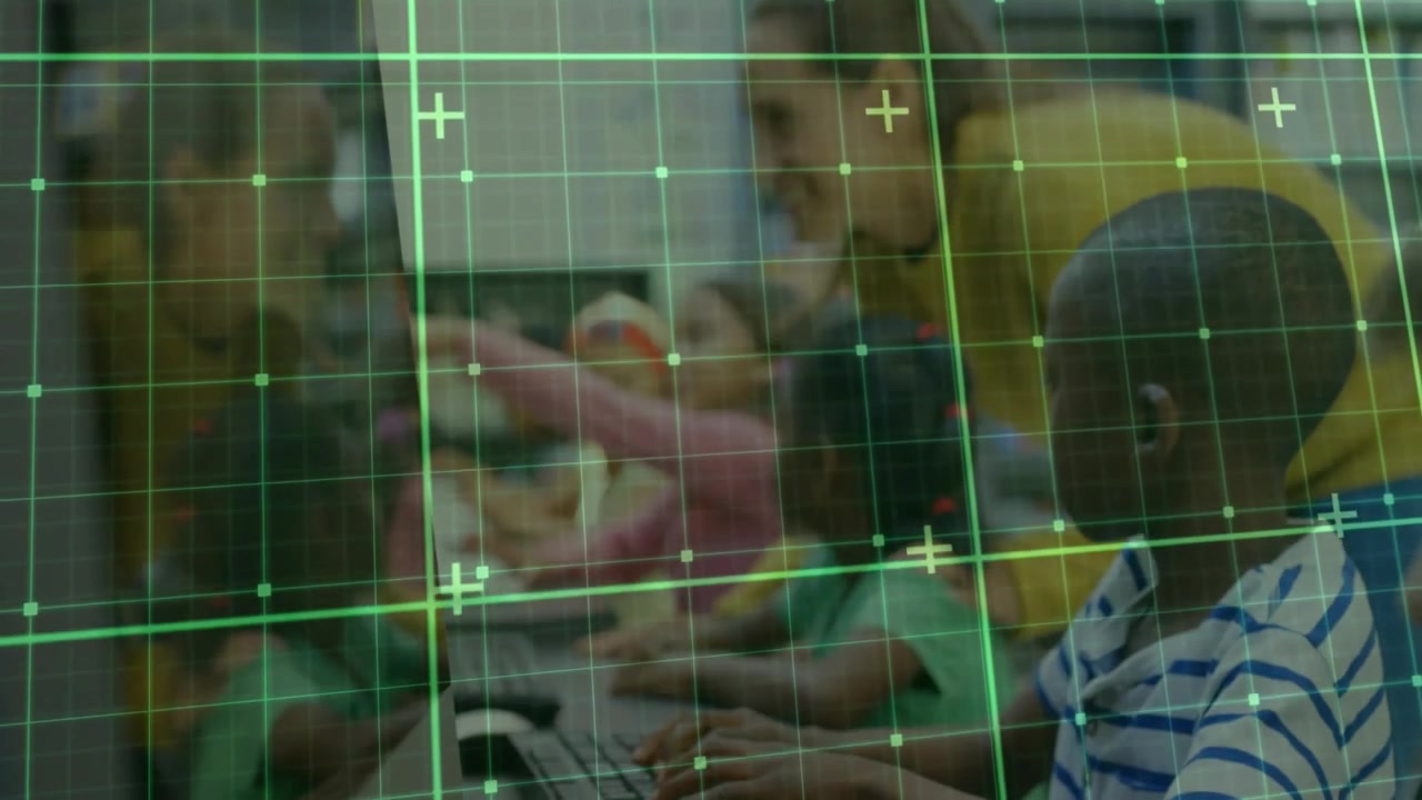 Flickering green grid overlay activating students typing in school lab while teacher guiding lesson