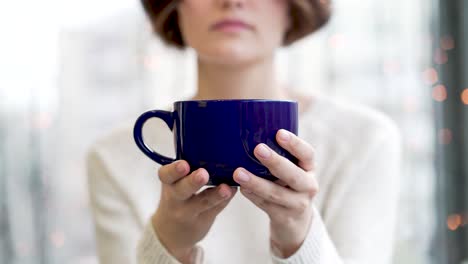 woman drinking coffee