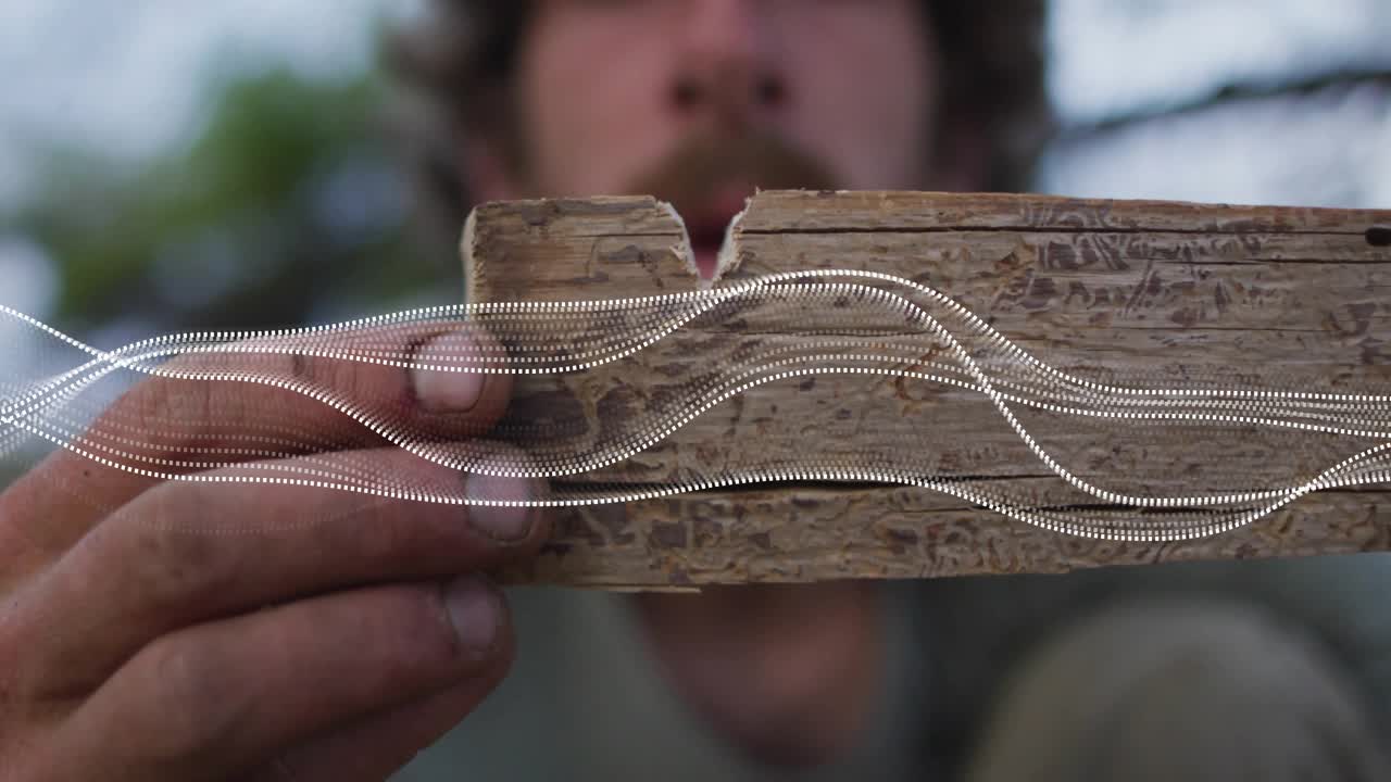 Craftsman positioning plank in technology demo activating animated waveforms mapping V-shaped notch