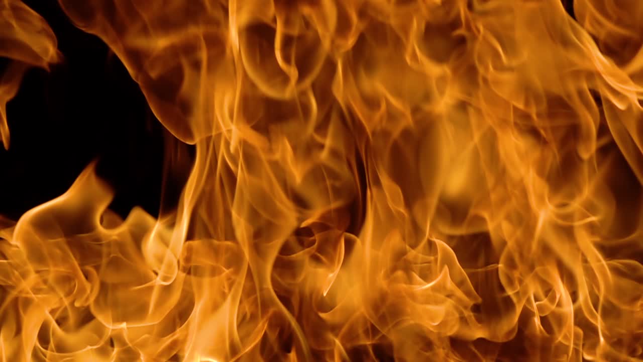 Flames of fire on black background in slow motion