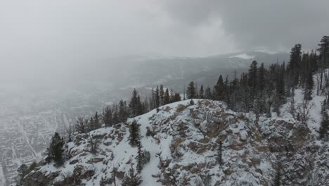 drone revealing snow covered frisco in colorado, usa. copper mountain.